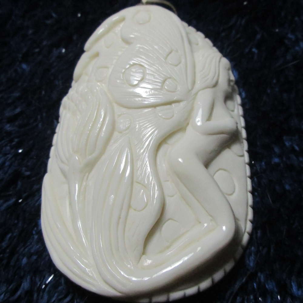 Butterfly wing fairy pendant carved bone necklace